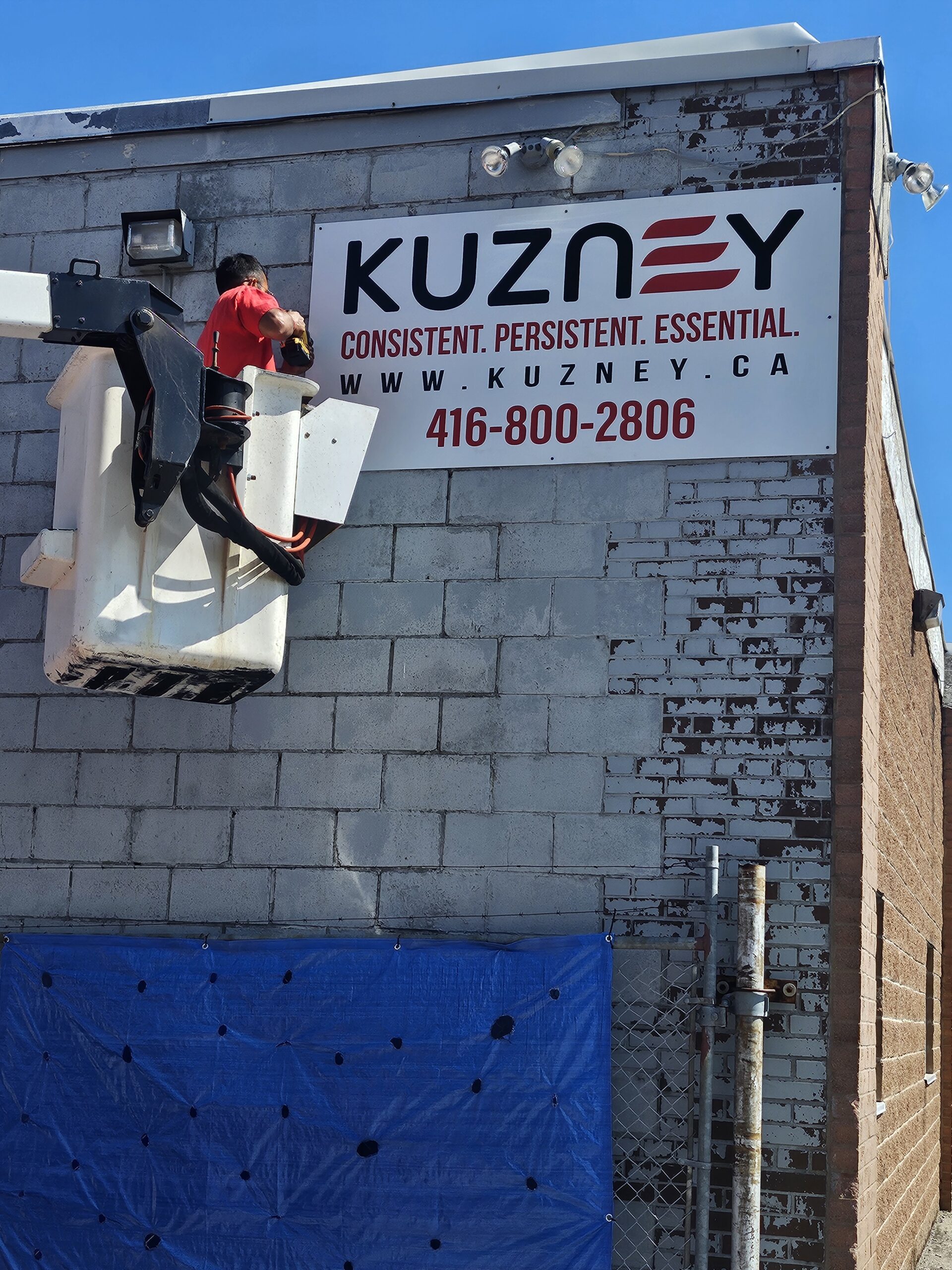 KUZNEY company sign installation at Greater Toronto Area business location